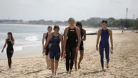 Raut kecewa para perenang usai finish dalam nomor 5K 12th Asian Open Water Swimming Championship 2026 di Pantai Jimbaran pada Sabtu (13/6/2026). (Bola.com/Alit Binawan)