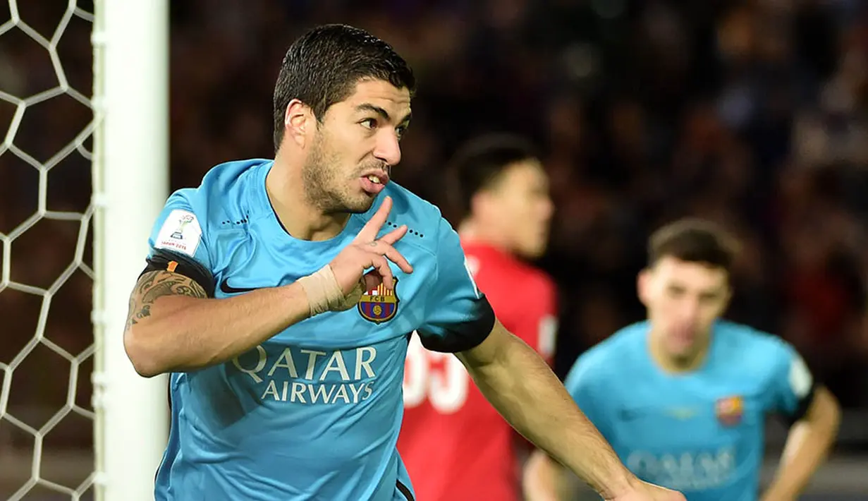 Perayaan gol yang dilakukan bomber Barcelona, Luis Suarez, usai membobol gawang Guangzhou Evergrande. (AFP/Kazuhiro Nogi)
