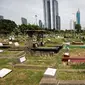 Suasana area pemakaman di Tempat Pemakaman Umum (TPU) Utan Jati, Jakarta, Kamis (11/1). Pemprov DKI melalui Dinas Kehutanan telah mengalokasikan anggaran sebesar Rp 400 miliar untuk pengadaan lahan makam TPU pada tahun ini. (Liputan6.com/Faizal Fanani)