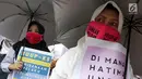 Massa Kolaborasi Nasional melakukan aksi di depan Gedung DPR/MPR, Jakarta, Selasa (17/9/2019). Massa kompak membawa poster bernada dukungan agar DPR segera mengerahkan Rancangan Undang-Undang (RUU) Penghapusan Kekerasan Seksual (PKS). (Liputan6.com/JohanTallo)