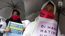 Massa Kolaborasi Nasional melakukan aksi di depan Gedung DPR/MPR, Jakarta, Selasa (17/9/2019). Massa kompak membawa poster bernada dukungan agar DPR segera mengerahkan Rancangan Undang-Undang (RUU) Penghapusan Kekerasan Seksual (PKS). (Liputan6.com/JohanTallo)