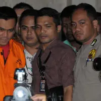 Ketua Komisi D DPRD DKI Jakarta dari partai Gerindra M usai di periksa sebagai tersangka di KPK, Sabtu, dini hari (2/4). (Liputan6.com/Helmi Afandi)