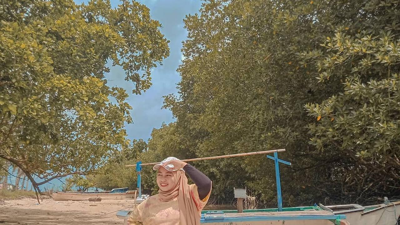 6 Inspirasi OOTD Hijab Pantai Simpel yang Nyaman dan Stylish, Cocok untuk Foto - Main Air