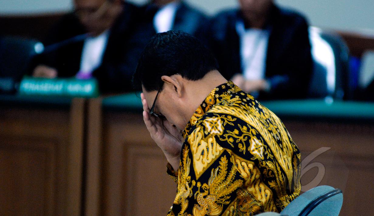 Terdakwa mantan Wakil Kepala Korlantas Mabes Polri, Brigjen (Pol) Didik Purnomo menjalani sidang pembacaan vonis di Pengadilan Tipikor, Jakarta, Rabu (22/4/2015). Didik divonis lima tahun penjara terkait kasus simulator SIM. (Liputan6.com/Yoppy Renato)