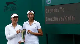 Berpasangan dengan petenis Tiongkok, Qiu Yu Ye, Tami mengalahkan Marie Bouzkova/Dalma Galfi, 6-2, 7-6(5), Minggu (6/7/2014) (Wimbledon.com)