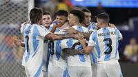 Dua gol Timnas Argentina dicetak oleh Julian Alvarez dan Lionel Messi. (AP Photo/Adam Hunger)