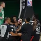 Selebrasi pemain Raptors usai menang dramatis atas Celtics (AP)