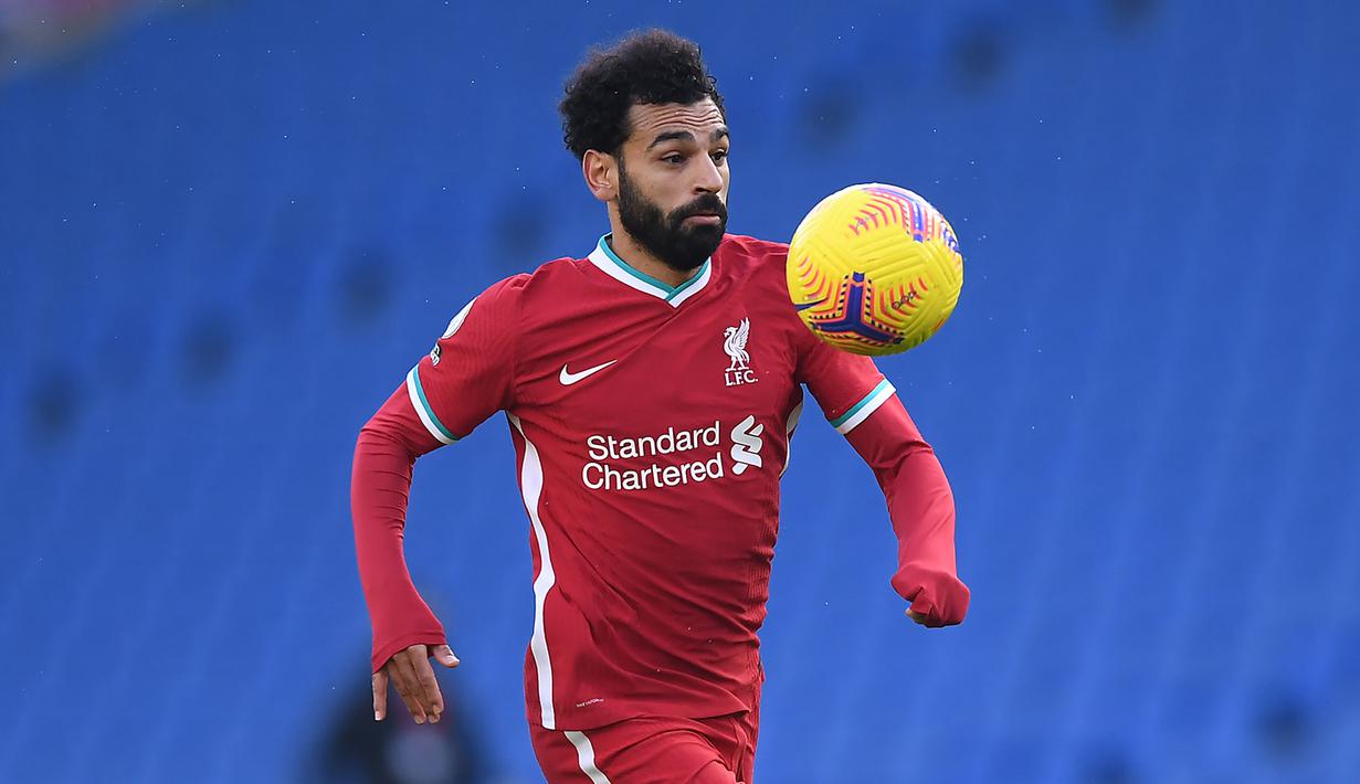 5. Mohamed Salah (23 gol) - Mohamed Salah tetap tampil konsisten dan tajam di sepanjang tahun 2020 ini. Pemain asal Mesir ini tercatat telah menyumbangkan 23 gol untuk Liverpool di semua kompetisi sepanjang tahun 2020. (AFP/Neil Hall/pool)