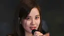 Aktris sekaligus member SNSD atau Girls Generation, Seohyun memberikan keterangan sebelum berangkat menuju Pyongyang, di Bandara Internasional Gimpo, Seoul, Sabtu (31/3). Seohyun didapuk menjadi MC untuk pertunjukan seni di Pyongyang. (Jung Yeon-je/AFP)