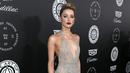 Aktris Amber Heard berpose saat menghadiri penggalangan dana "HEAVEN" 11 tahunan di Barker di Santa Monica, California (6/1). (AFP Photo/Phillip Faraone)