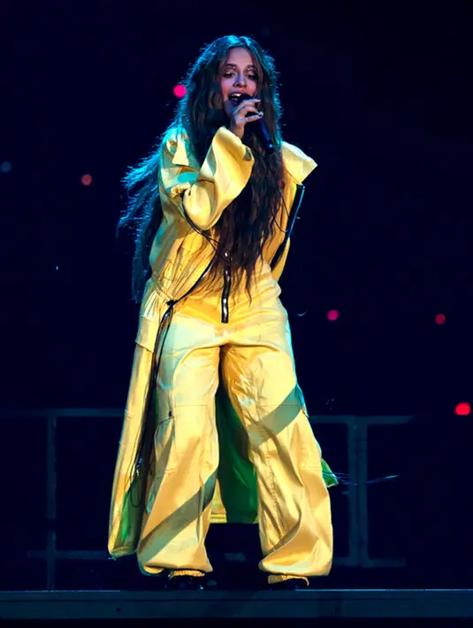 <p>Camila Cabello tampil pada festival musik Rock in Rio di Rio de Janeiro, Brasil, 10 September 2022. Penampilan Camila Cabello memiliki strukturnya sendiri, tarian yang disinkronkan dengan pergantian banyak kostum. (AP Photo/Bruna Prado)</p>