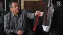 Sekretaris Jenderal DPR, Indra Iskandar berada di ruang tunggu sebelum menjalani pemeriksaan di gedung KPK, Jakarta, Senin (22/4). Indra Iskandar diperiksa sebagai saksi untuk tersangka Romahurmuziy terkait kasus dugaan jual beli jabatan di Kementerian Agama tahun 2018-2019 (merdeka.com/Dwi Narwoko)