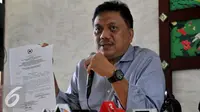 Mantan Ketua Fraksi PDIP DPR Olly Dondokambey memberikan keterangan kepada wartawan terkait pengunduran dirinya sebagai anggota DPR dalam jumpa pers di Jakarta, Rabu (28/10/2015). (Liputan6.com/Johan Tallo)