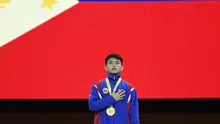 Pesenam Filipina, Carlos Edriel Yulo, kabarnya akan menjadi penyala kaldron dalam upacara pembukaan SEA Games 2019. (AFP/Thomas Kienzle)