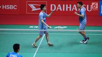 Ganda putera Indonesia, Kevin Sanjaya/Marcus Gideon mengepalkan tangan saat melawan Hendra Setiawan/Rian Saputro pada babak kedua Indonesia Masters 2018 di Istora Senayan, Kamis (25/1). Kevin/Marcus unggul 21-16, 23-21. (Liputan6.com/Helmi Fithriansyah)