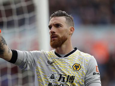 Nama pertama ada Jose Sa. Ia didatangkan ke Wolverhampton menyusul penunjukan manajer baru mereka, Bruno Lage. Pemain 28 tahun tersebut mampu tampil lebih baik dari pendahulunya dengan mencatatkan 11 clean sheet dalam 32 laga. (AFP/Adrian Dennis)