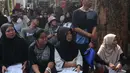 Pemerintah melalui Perum Bulog kembali melakukan penyaluran bantuan pangan beras tahap dua di wilayah Jakarta yang disalurkan sebanyak 2.690 ton per bulannya kepada Keluarga Penerima Manfaat (KPM). (merdeka.com/Imam Buhori)