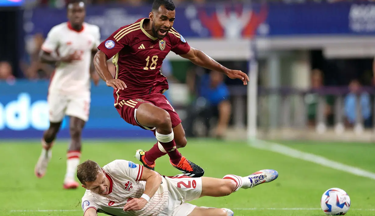 Les Rouges berhasil mengandaskan perlawanan Venezuela lewat babak adu penalti. (CHARLY TRIBALLEAU/AFP)