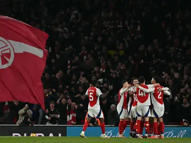 Gelandang Arsenal, Ethan Nwaneri merayakan golnya saat pertandingan sepak bola Liga Premier Inggris melawan Manchester City di Stadion Emirates, London pada 2 Februari 2025. (Glyn KIRK/AFP)