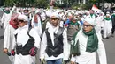 Anggota Laskar Front Pembela Islam (FPI) melakukan konvoi melintas di kawasan Bundaran HI, Jakarta, Rabu (22/5/2019). FPI mengerahkan simpatisannya di Jabodetabek untuk berdemonstrasi terkait hasil rekapitulasi suara Pemilu 2019 di gedung Bawaslu. (Liputan6.com/Immanuel Antonius)