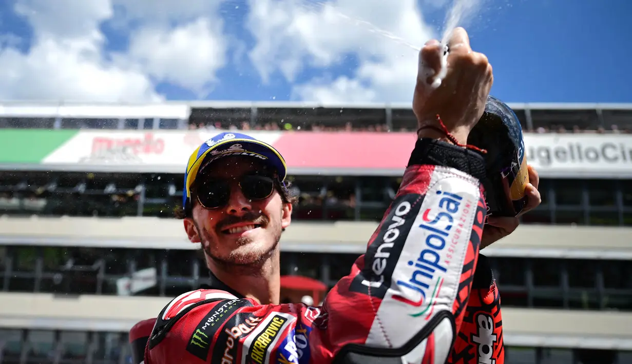 Francesco Bagnaia mencatat waktu 19 menit 30.251 detik. (Marco BERTORELLO/AFP)
