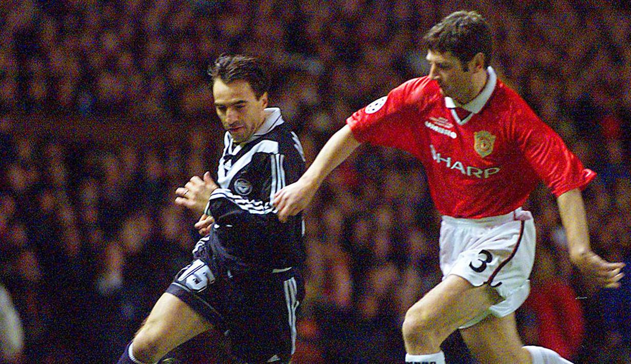 Denis Irwin diboyong MU dari Oldham Athletic seharga 625 ribu poundsterling. Irwin membela United sebanyak 529 kali selama 12 musim. (AFP/Michel Gangne)