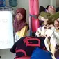 Pasien penderita kelumpuhan, Humaida dan keluarga di Kabupaten Paser, Kaltim. (Liputan6.com/Abelda Gunawan)