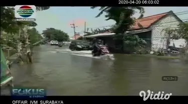 Musim penghujan yang belum usai menambah ancaman baru di tengah pandemi corona. Seperti banjir di Lamongan belasan desa masih di kepung banjir.