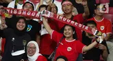 Suporter Timnas Indonesia memberikan dukungan dalam lanjutan Kualifikasi Piala Dunia 2026 melawan Filipina di Stadion Utama Gelora Bung Karno, Jakarta, Selasa (11/6/2024). (Liputan6.com/Herman Zakharia)