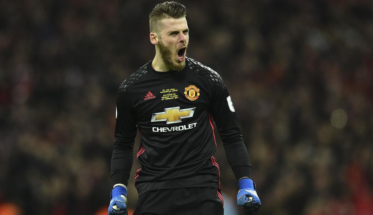 David de Gea menjadi salah satu pemain incaran Real Madrid pada bursa transfer januari 2018, kapten Real Madrid Sergio Ramos ikut mendesak klub tersebut untuk menandatangani kontrak dengan kiper Setan Merah tersebut.  (AFP/Glyn Kirk)