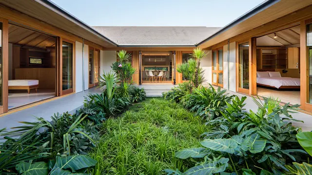 Contoh Rumah 1 Lantai Konsep Taman Terbuka di Tengah Ruangan (AI)