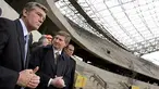 President of Ukraine Viktor Yushchenko (L) and President of FC Shakhtar, multi-millionaire Rinat Akhmetov (2L) visit the construction site of a stadium in the country's eastern industrial city of Donetsk on April 17, 2008. AFP PHOTO/MYKOLA LAZARENKO