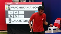 Aditya Sasongko menyumbang poin pertama untuk Indonesia dalam final tenis beregu melawan Thailand di SEA Games 2015 Singapura (Liputan6.com/Helmi Fithriansyah)