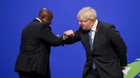 PM Inggris Boris Johnson dan Presiden Ghana, Nana Akufo-Addo. Dok: COP26