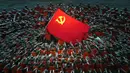Partai Komunis China memperingati 100 tahun, Kamis (1/7). Berdiri seabad, Partai Komunis China menjelma menjadi parpol penguasa di Negeri Tirai Bambu. (AP Photo/Ng Han Guan)