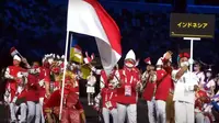 Tim Paralimpiade Indonesia di Tokyo. Para atlet tampak elegan dengan vest merah dan batik putih. Dok: KBRI Tokyo