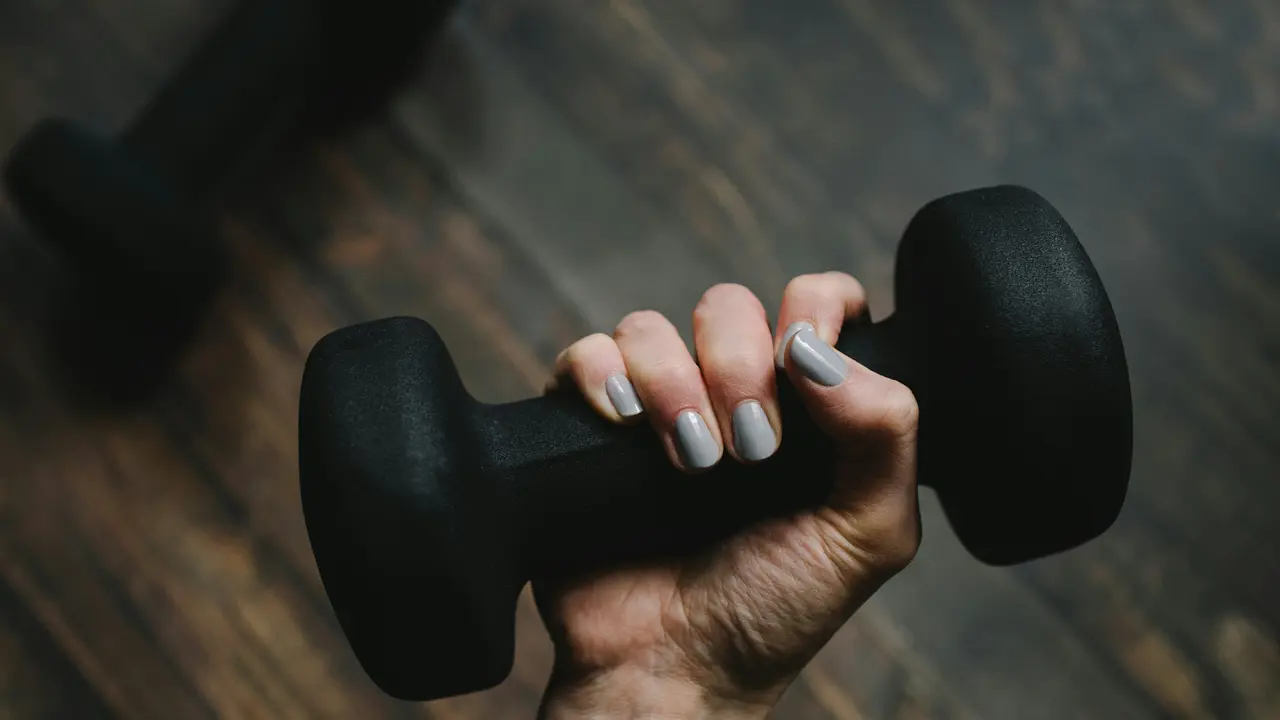 Woman with dumbbell