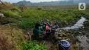 Bantuan air dari dinas terkait masih terbatas seminggu sekali dan  langsung habis pada hari pembagian. (merdeka.com/Arie Basuki)