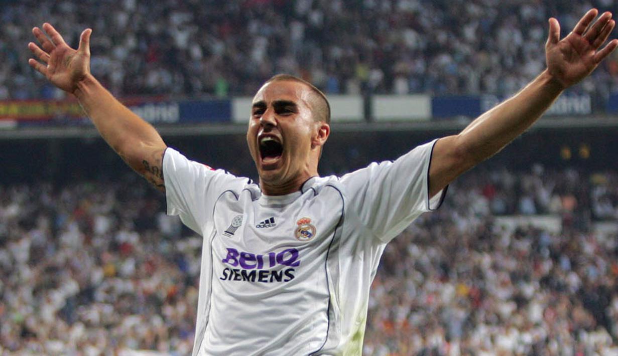 Fabio Cannavaro - Bek Real Madrid itu menjadi yang terbaik di dunia pada tahun 2006. Gelar itu tak lepas dari kesuksesan kapten Italia itu meraih gelar Piala Dunia 2006. (AFP/Pierre-Philippe Marcou)