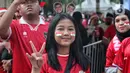 Beberapa suporter rela mencat bagian wajah sebagai bentuk totalitas mendukung timnas Indonesia. (Liputan6.com/Angga Yuniar)