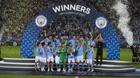 Manchester City berhasil membungkam Sevilla lewat adu penalti dengan skor 5-4 pada laga Piala Super Eropa 2023 di Georgios Karaiskakis Stadium, Piraeus, Kamis (17/8/2023) dini hari WIB. Penentuan pemenang dilakukan lewat adu penalti, karena kedua tim bermain imbang 1-1 selama 2x45 menit. Berkat hasil tersebut, Man City meraih trofi perdana di Piala Super Eropa.&nbsp;(AP Photo/Thanassis Stavrakis)