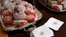 Burger memenuhi meja makan saat Presiden AS Donald Trump menjamu Clemson Tigers di Gedung Putih, Washington, Senin (14 /1). Trump mengaku menyukai semua makanan cepat saji yang disajikan. (AP Photo/Susan Walsh)
