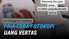 Seorang pria mencoba memfotokopi selembar uang kertas menggunakan mesin fotokopi.