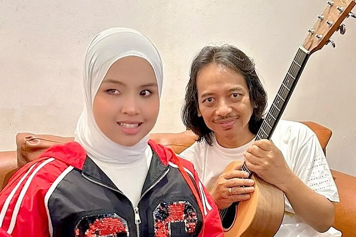 Putri Ariani dan Dewa Budjana. (Instagram/ arianinismaputri)
