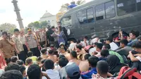 Puluhan pelajar STM di Kota Palembang diamankan polisi saat hendak berkumpul menggelar demo (Liputan6.com / Nefri Inge)