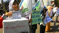 Warga Aceh masih geram atas pernyataan Perdana Menteri Australia Tony Abbott yang mengungkit soal bantuan A$ 1 miliar saat tsunami 2004. (Windy Phagta/Liputan6.com)