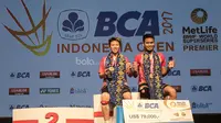 Pasangan Tontowi Ahmad/Liliyana Natsir, menang atas wakil China, Zheng Siwei/Chen Qingchen, dengan skor 22-20, 21-15 pada partai final Indonesia Open 2017 di JCC, Minggu, (18/6/2017). (Bola.com/Vitalis Yogi Trisna)