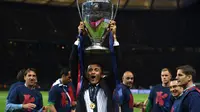 Pelatih Luis Enrique sukses membawa Barcelona juara La Liga Spanyol di musim pertamanya (PATRIK STOLLARZ / AFP)