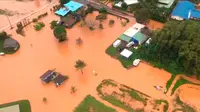 Banjir di Kauai, Hawaii, dilihat dari helikopter. (Petty Officer 3rd Class Brandon Verdura/ US Coast Guard via AP)