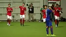 Penyerang timnas Indonesia U-23, Muchlis Hadi Ning Syaifulloh (kedua kiri) melakukan selebrasi usai mencetak gol ke gawang Kamboja pada laga lanjutan Grup A Sea Games 2015 di Stadion Jalan Besar, Singapura, (6/6/2015). (Liputan6.com/Helmi Fithriansyah)